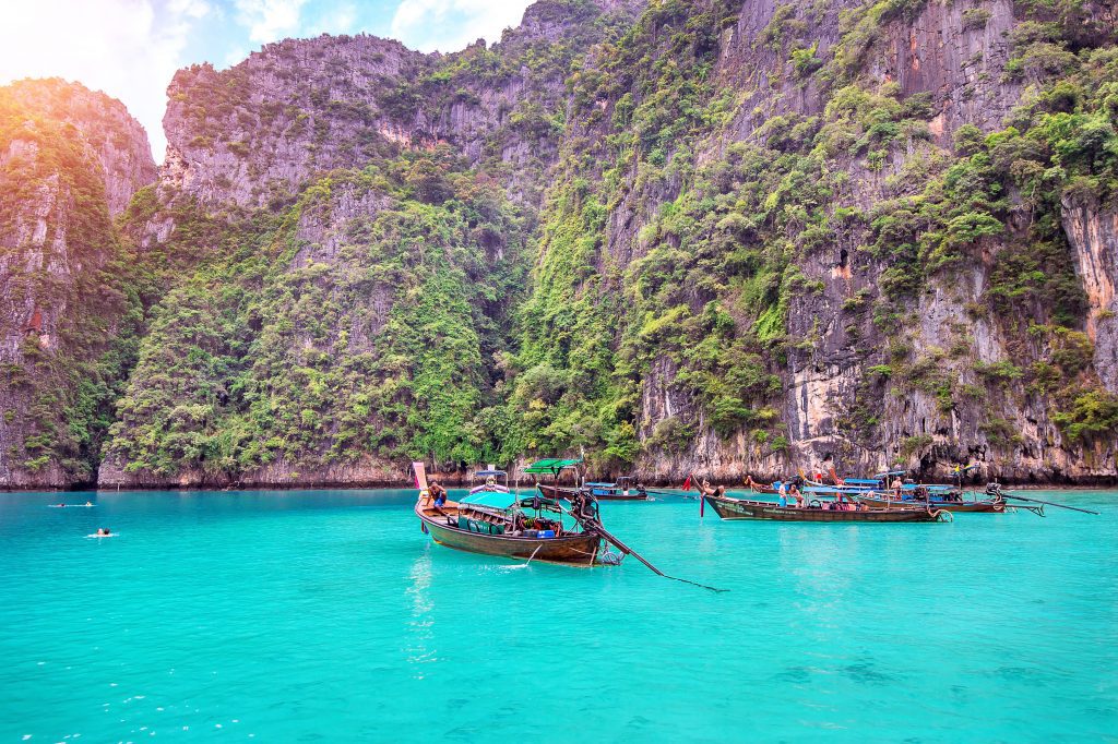 Long boat and blue water at Maya bay in Phi Phi Island, Krabi Th